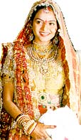 Film star Madhoo draped in wedding finery
