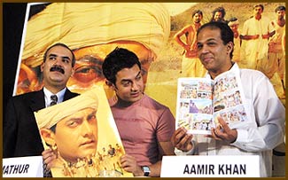 Uday Mathur of Egmont, Aamir Khan and Ashutosh Gowariker pose with the merchandise