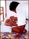 Baba Amte getting medical attention