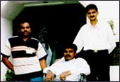 B. Suresh Kamath with some members of his team