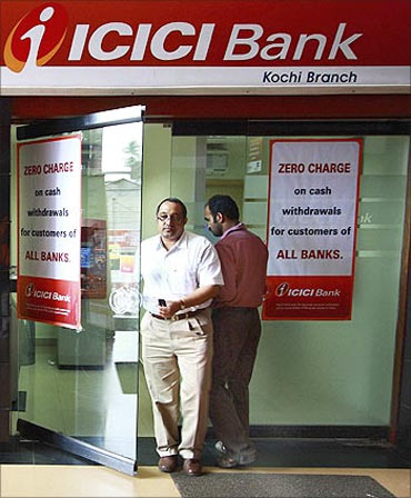 A man leaves an ATM facility of ICICI bank in the southern Indian city of Kochi.