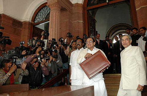 (From left) Finance Minister P Chidambaram with Railway Minister Pawan Kumar Bansal.