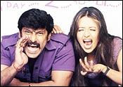 Vikram and Jyothika in Dhool