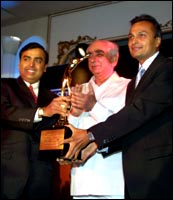 Mukesh Ambani and Anil Ambani receiving the Best Managed Company Award from Finance Minister Jaswant Singh. Photo: Jewella C Miranda