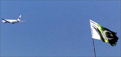 A Pakistan International Airlines plane, with Nawaz Sharif on board, takes off from Islamabad airport, September 10.