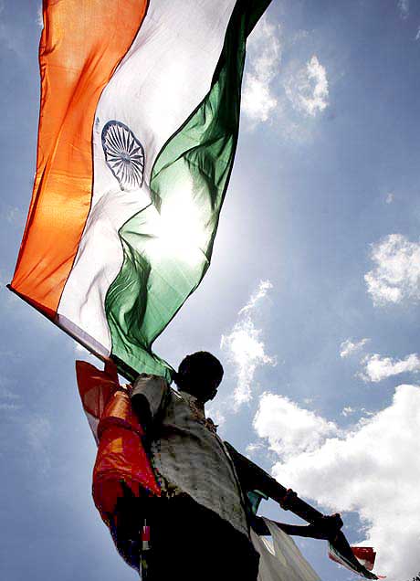 A man waves the Indian flag
