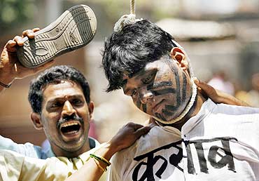 Bharatiya Janata Party activists stage a mock hanging of Kasab during a demonstration in Mumbai on May 4, 2010