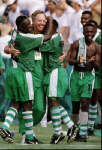 Bonfrere being hugged by Nigerian squad