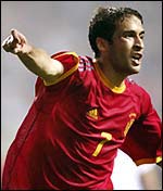 Raul celebrates after scoring the first goal for Spain
