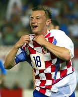 Ivica Olic celebrates after levelling for Croatia.