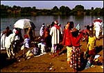 Bathing at the Godavari river at Paithan