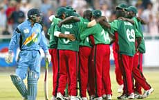 Kenyan team celebrates an Indian wicket