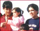 Aamir, his daughter and wife on the sets of Lagaan