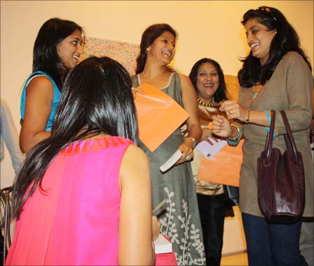 Amrita chats with a group of women at her book launch