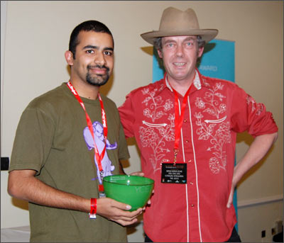 Vijay Nair (left) with his trophy, which was presented by Martin Elbourne