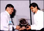 B. Suresh Kamath getting the Distinguished Alumnus Award from IIT Chennai