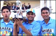 Indian cricket's latest stars Yuvraj Singh and Mohammad Kaif flanking skipper Sourav Ganguly.