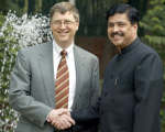 Microsoft chief Bill Gates with IT Minister Pramod Mahajan. Photo: Reuters
