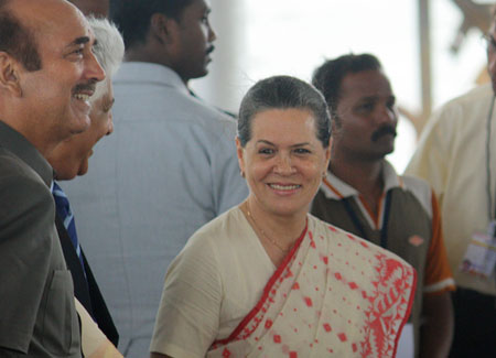 Sonia Gandhi smiles as she arrives