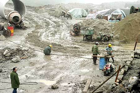Chinese workers prepare a road along the India-China route at Nathu La
