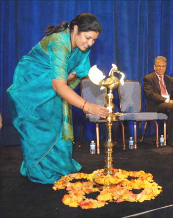 Daggubati Purandeswari, minister of state for human resource development, India, lights the ceremonial lamp.