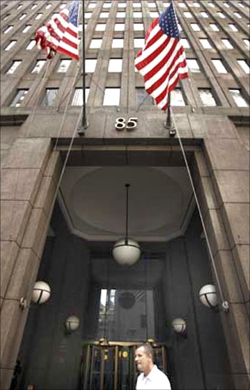 A man walks past the Goldman Sachs headquarters building in New York.