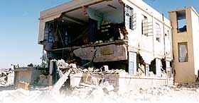 What should I do if my building is quake-damaged?