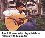 Amol Mhatre, who plays Krishna, relaxes with his guitar