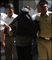 The burkha-clad Iqbal was brought to the court under tight security. Photograph: Jewella C Miranda