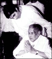 Harivansh Rai Bachchan (seated) with Amitabh Bachchan