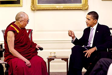 The Dalai Lama speaks to US President Obama at Map Room in White House on Thursday