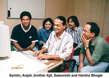 Harsha Bhogle with Sachin, Anjali and Ajit Tendulkar and Rediff's Saisuresh Sivaswamy at the keyboard when Sachin appeared on the Rediff Chat.