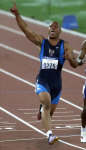 Maurice Greene wins in 9.87 seconds