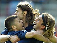 Gabriel Batistuta (R), Diego Placente (C) and Walter Samuel celebrate after the goal.