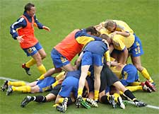 Sweden celebrate the first goal against Argentina
