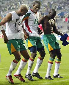 Senegal players celebrate their victory