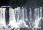 Tourists admire falls from the Argentine side